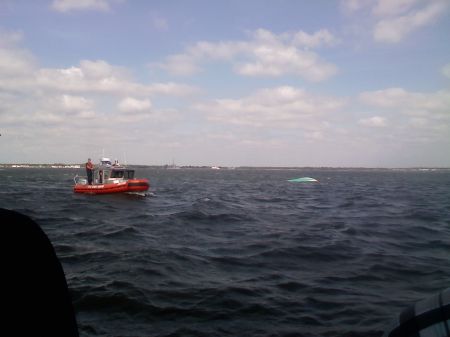 Capsized_boat_with_USCG_.jpg
